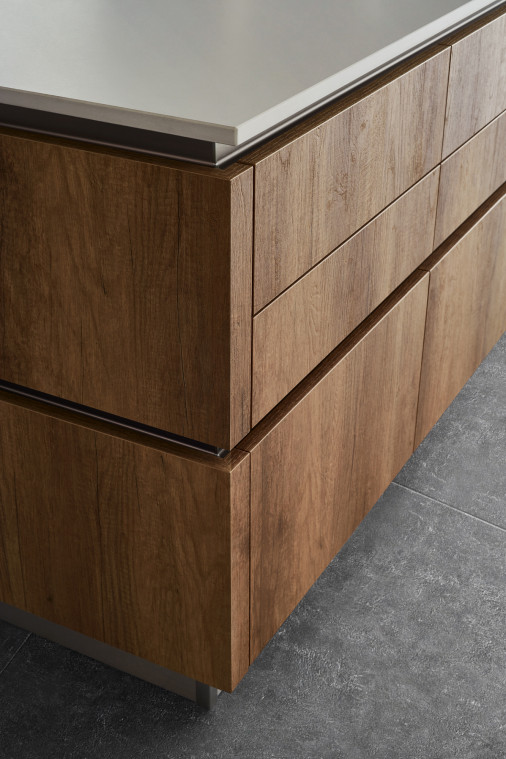 The decorative surface, because the material must be pleasing to the touch as well as to the eye.